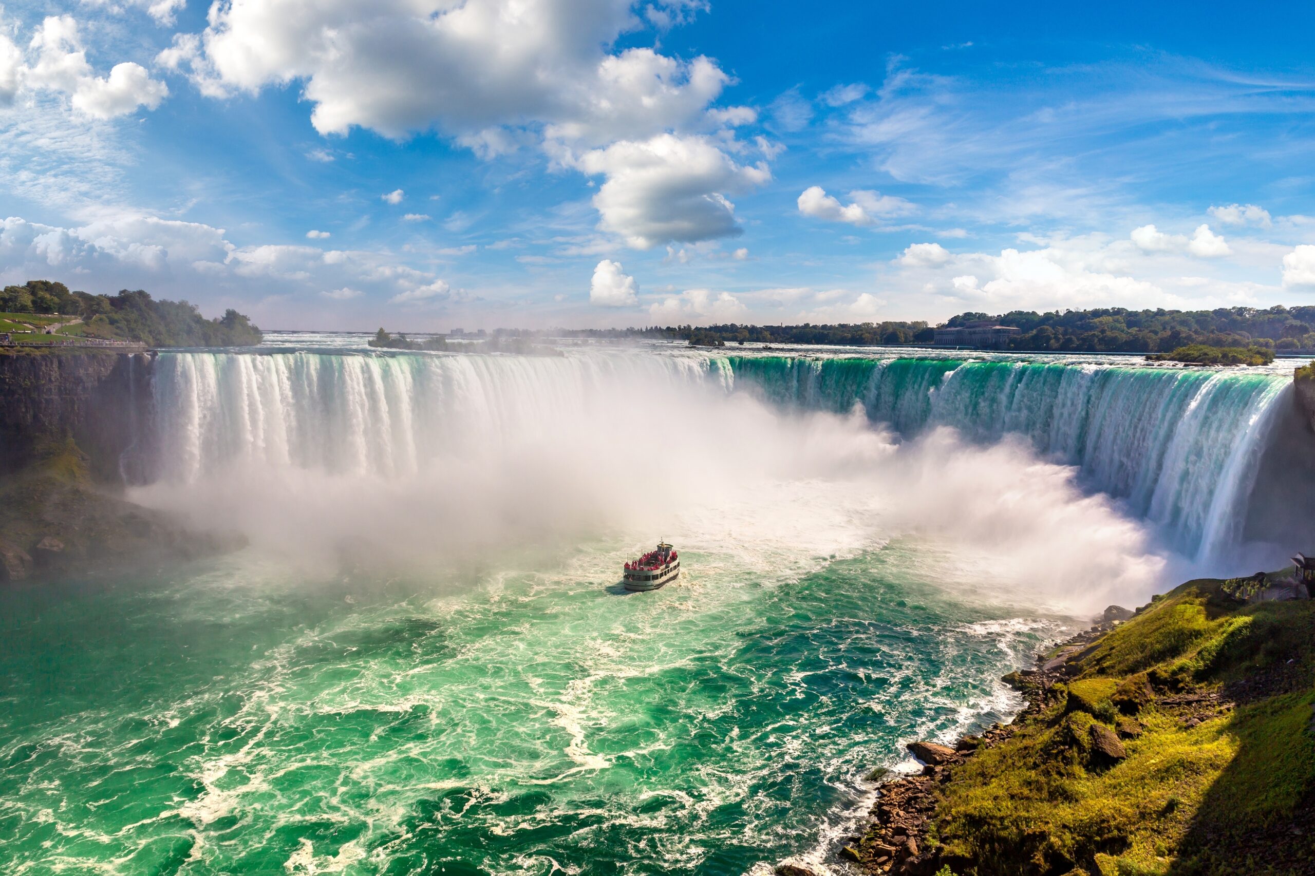 boat at bottom of Niagara Falls