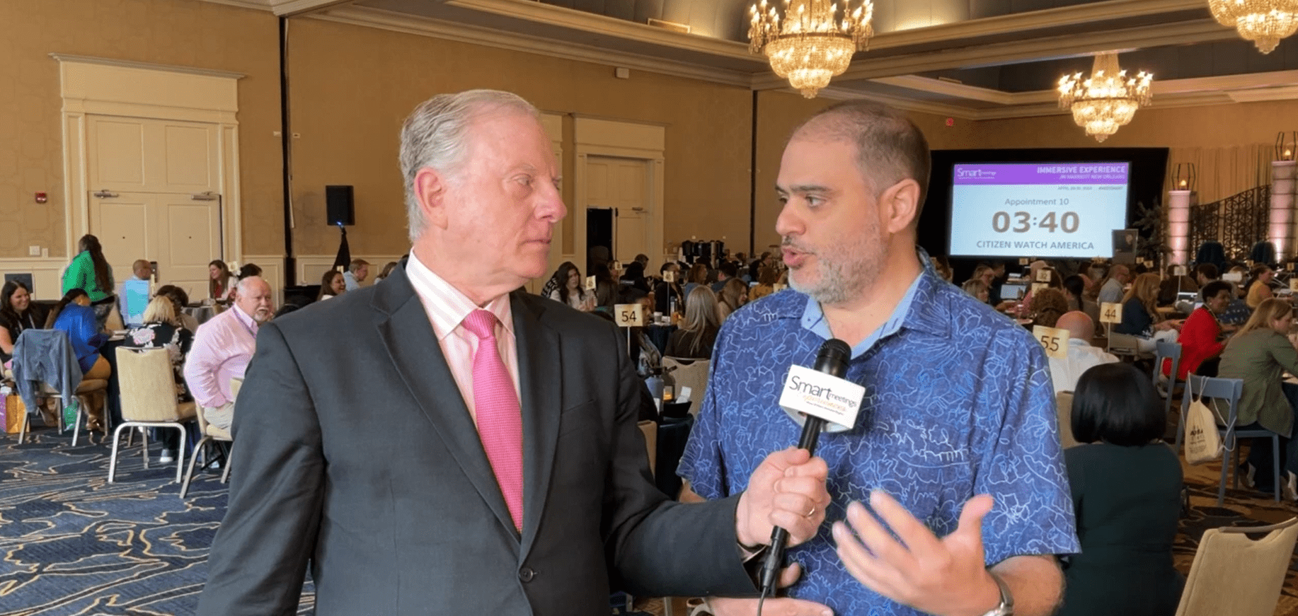 man interviewing another man at Smart Meetings Immersive Experience in New Orleans