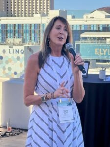 Kelly Gleeson talking into microphone