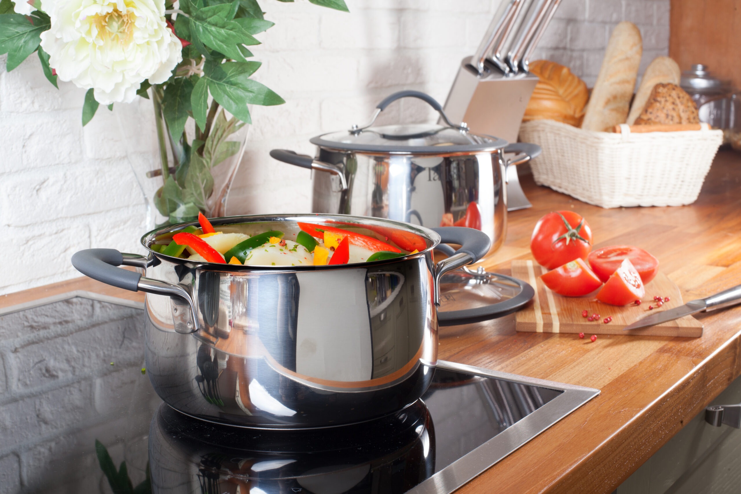 pan full of vegetables on electric stove