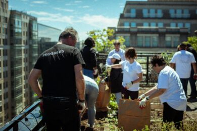 People gardening on rooftop