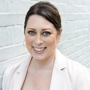 Melissa Braverman in white sport coat