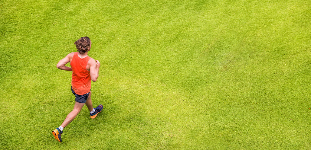 man running in field