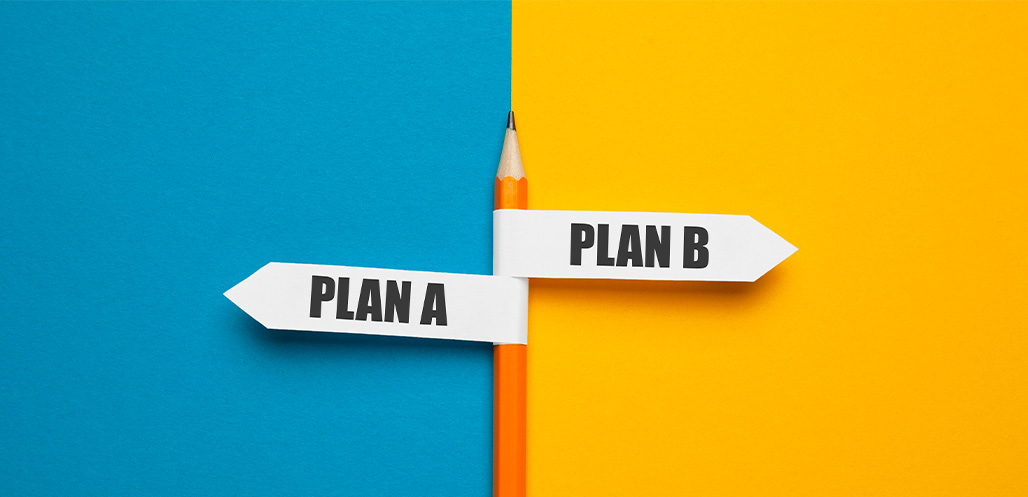 Plan A and Plan B notes hanging on pencil