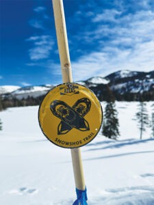 A marker on the trail for snowshoeing at Solitude Nordic & Snowshoe Center