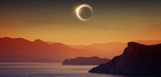 Solar eclipse above ocean