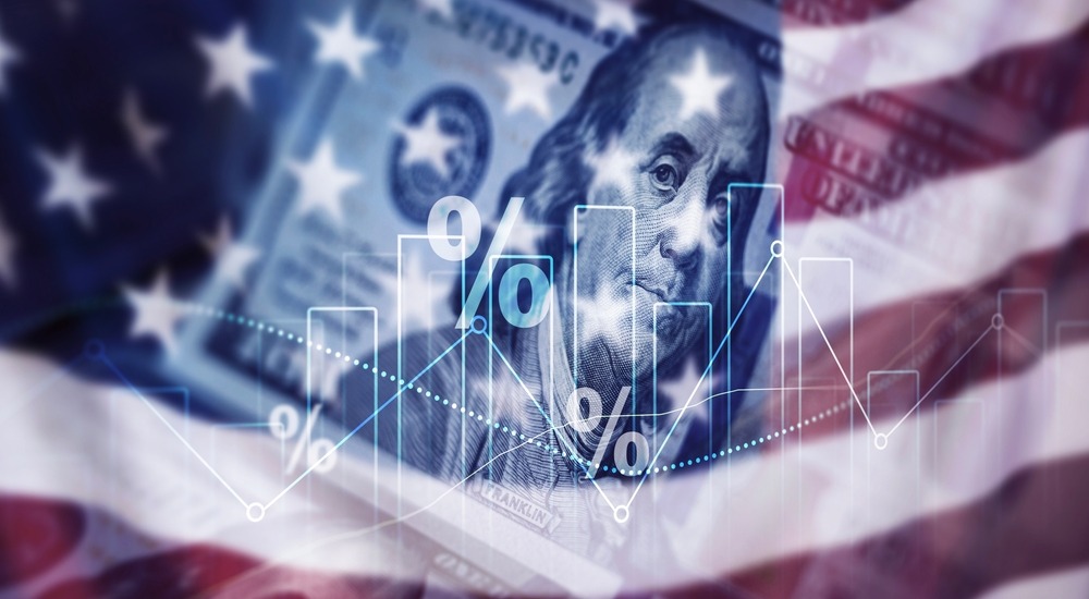United States flag and US $100 bill indicating tariffs