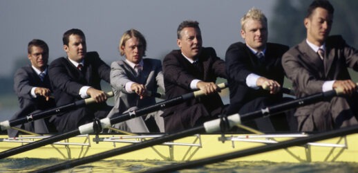 Rowers in business suits