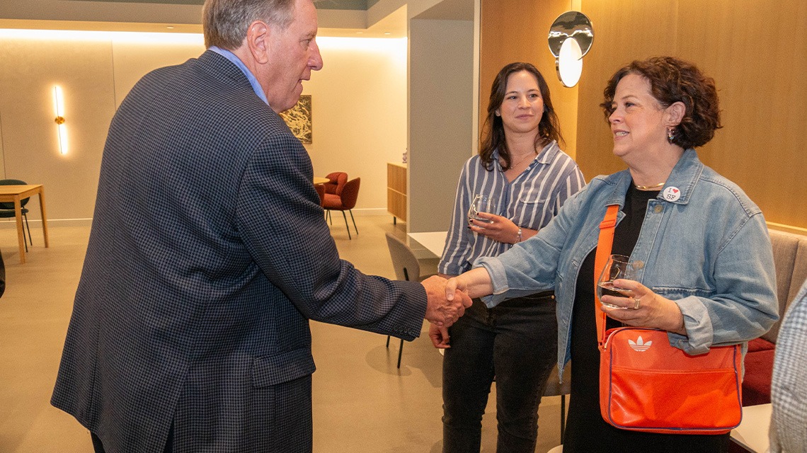 Gary Hernbroth shaking hands