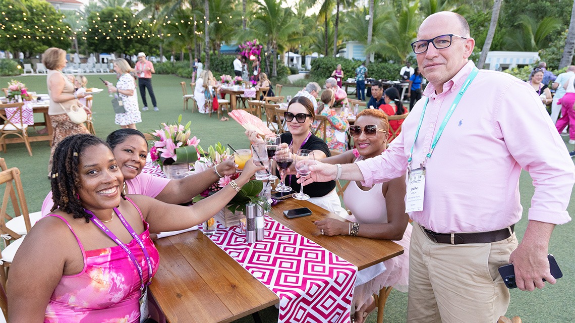 People clinking glasses