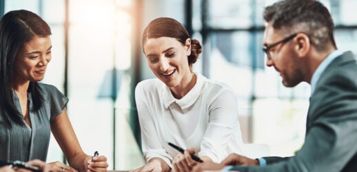 Three people meeting in conference room