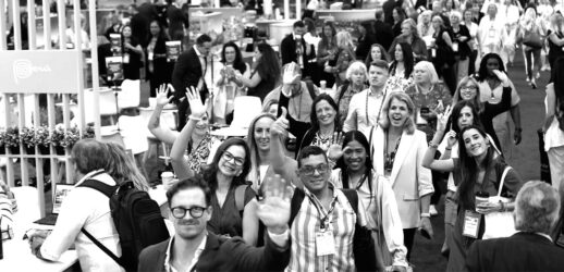 Black and white image of people at conference