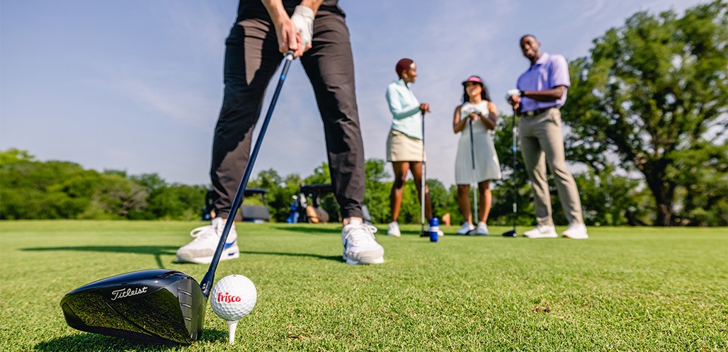 Zoomed in shot of person hitting a golf ball