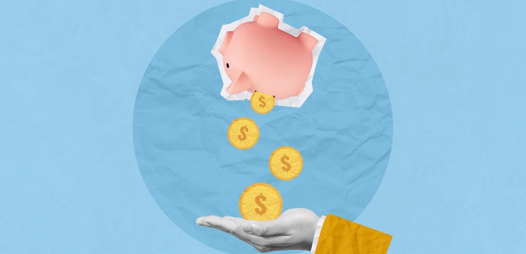 Gold coins falling into hand on blue background