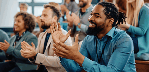 Close up of people clapping in crowd