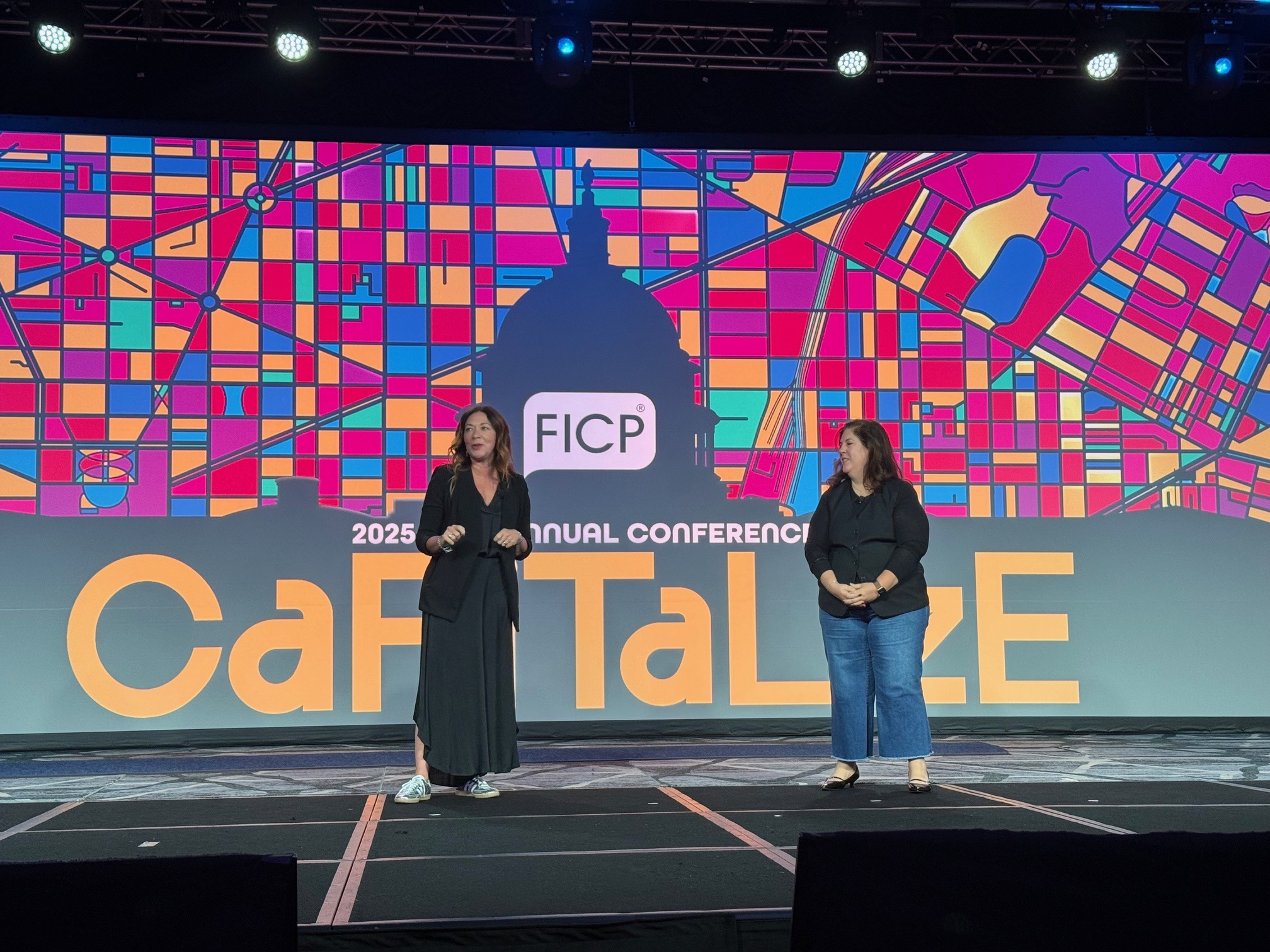 People talking on stage