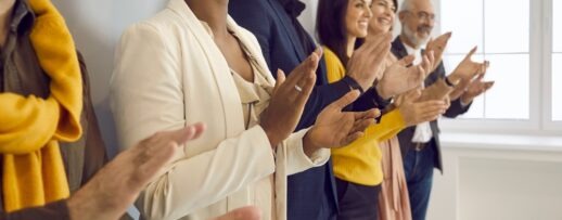 Businesspeople clapping