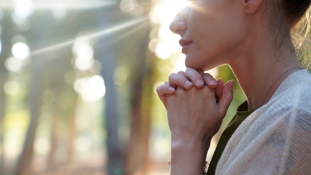 Woman resting chin on fists
