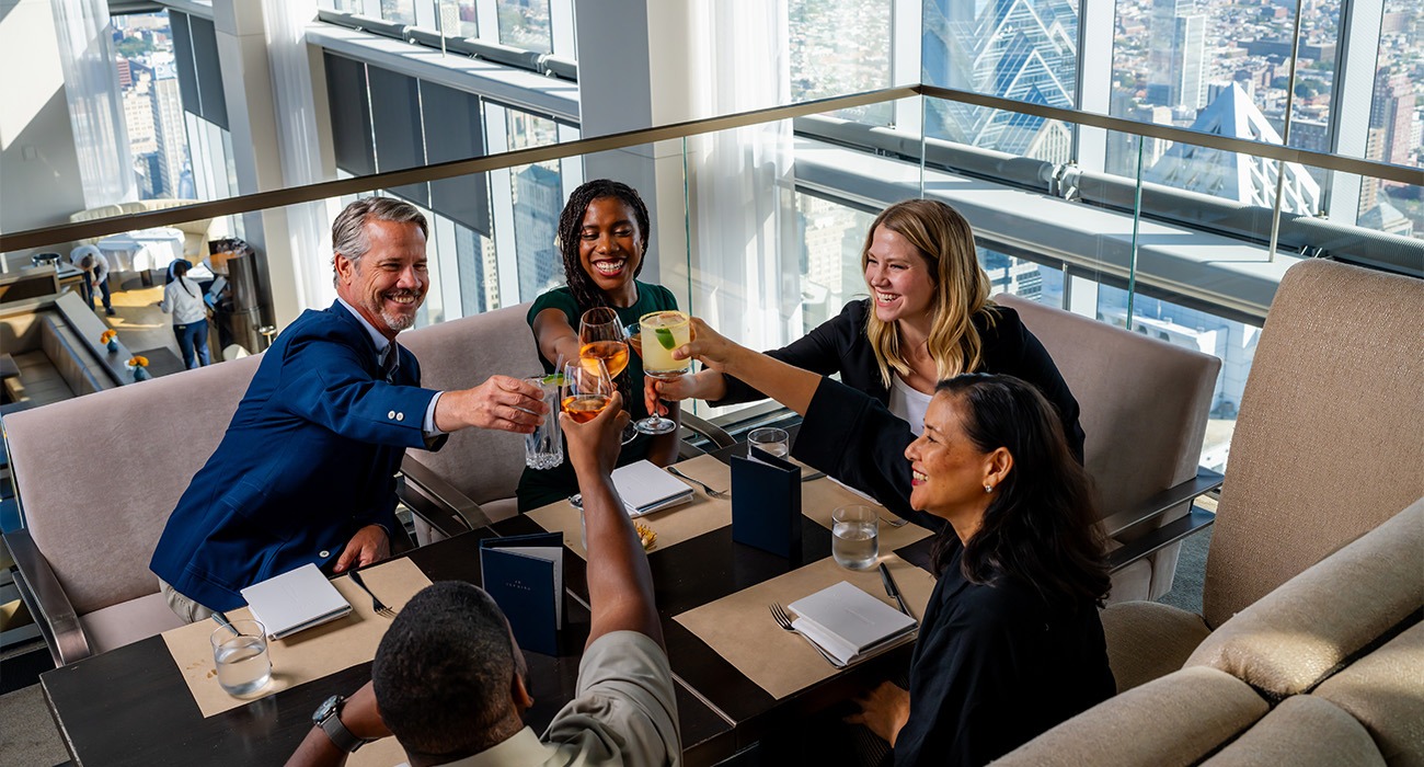 Five businesspeople at Four Seasons Hotel Philadelphia SkyHigh restaurant