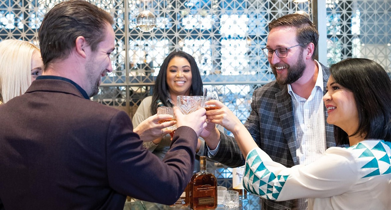 People meeting in Lewis + Louis Tasting Room