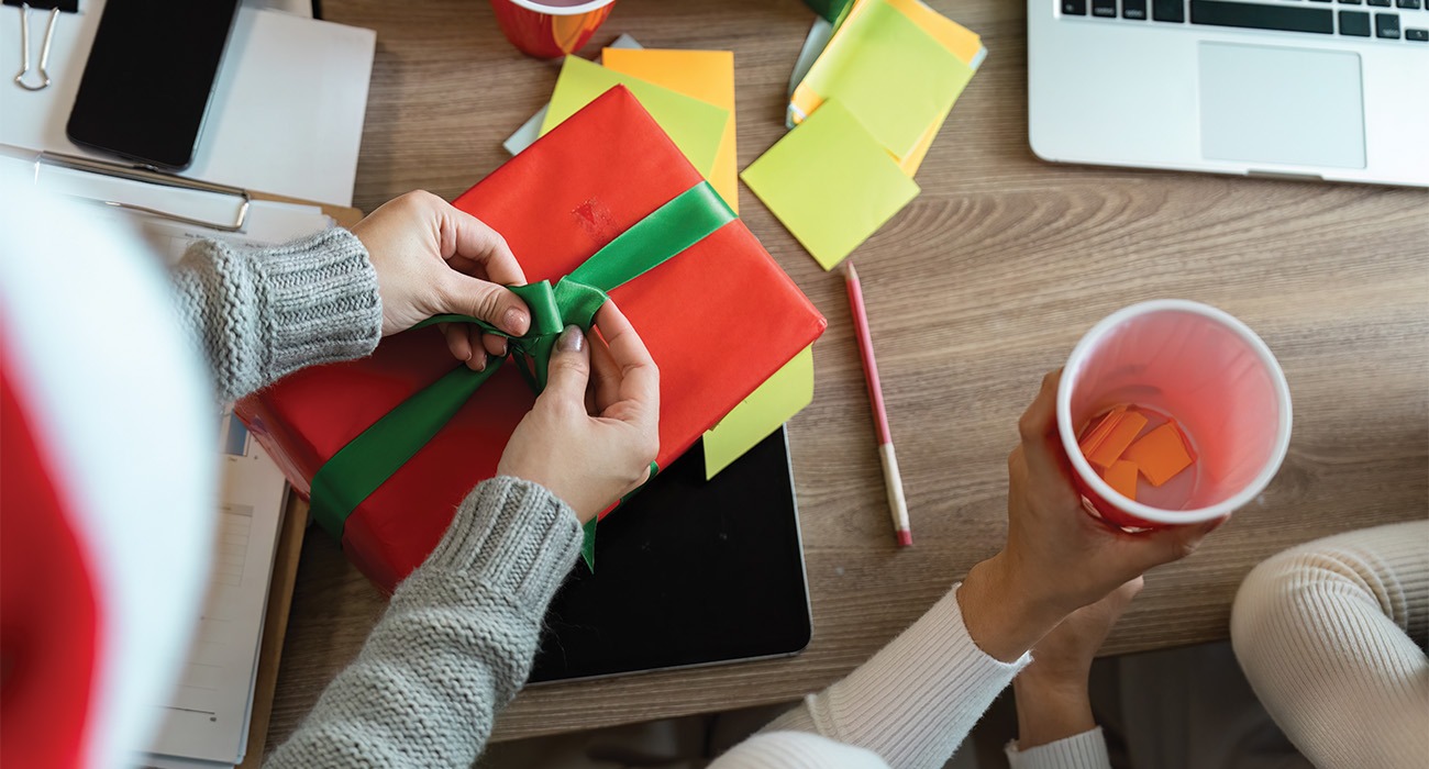 Person wrapping gift