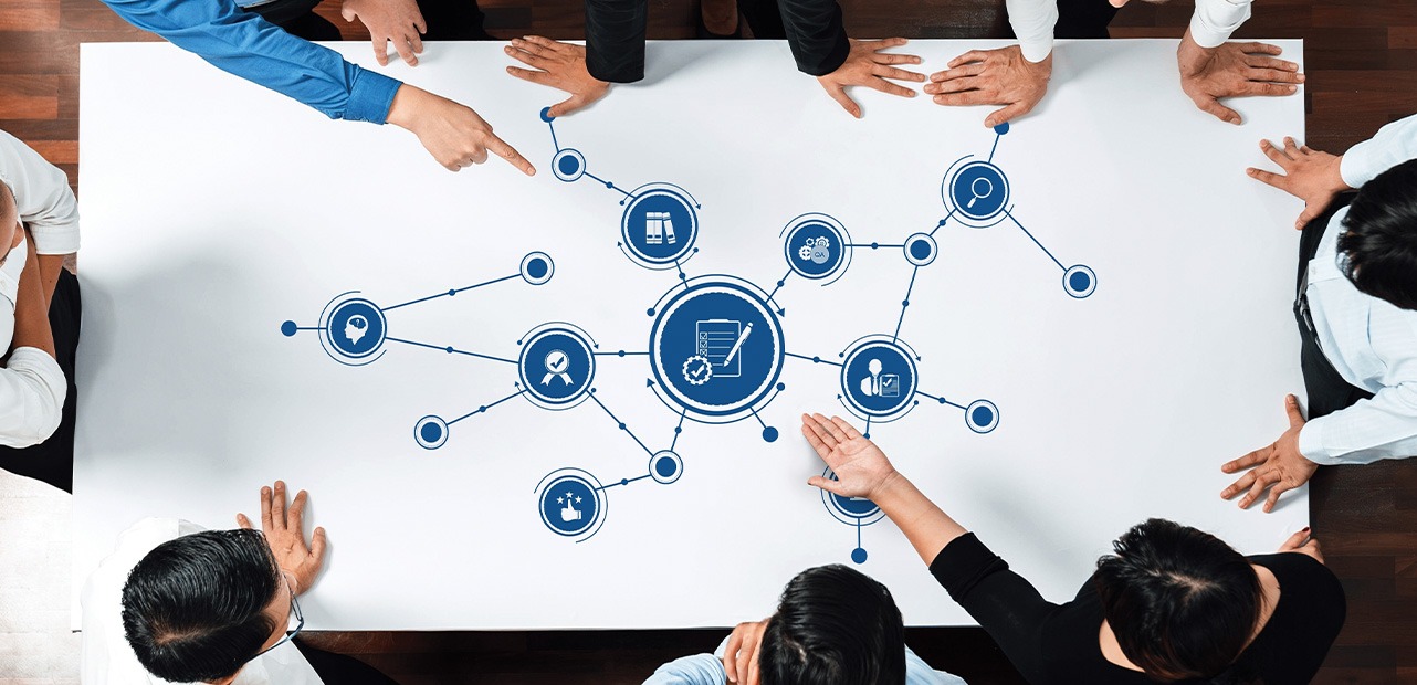 Businesspeople strategizing at table