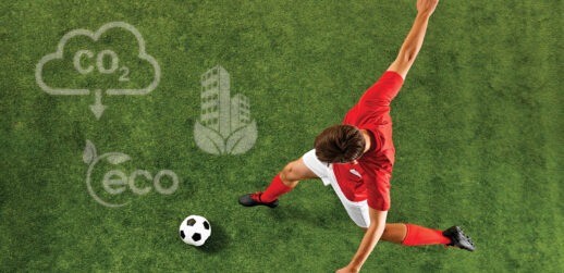 Aerial view of person kicking soccer ball