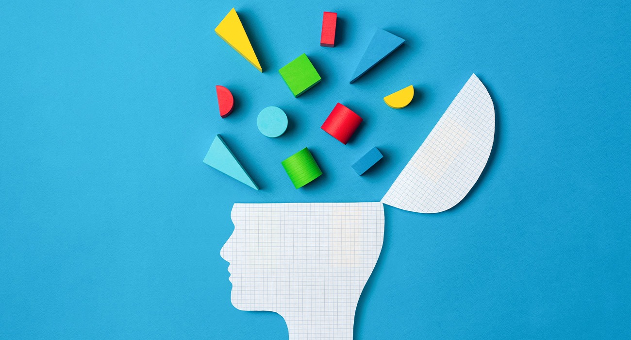 Illustration of color ideas coming out of person's head