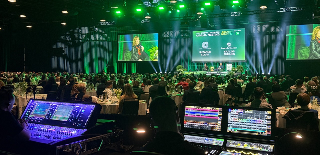 Live event shown from behind audiovisual section