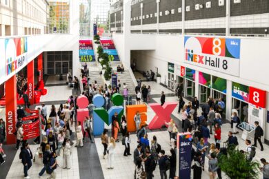 crowd in front of IMEX sign at IMEX Frankfurt