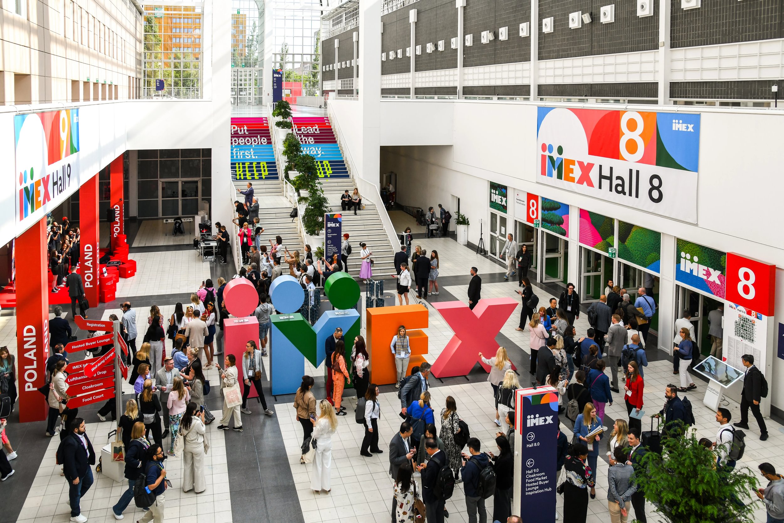 crowd in front of IMEX sign at IMEX Frankfurt