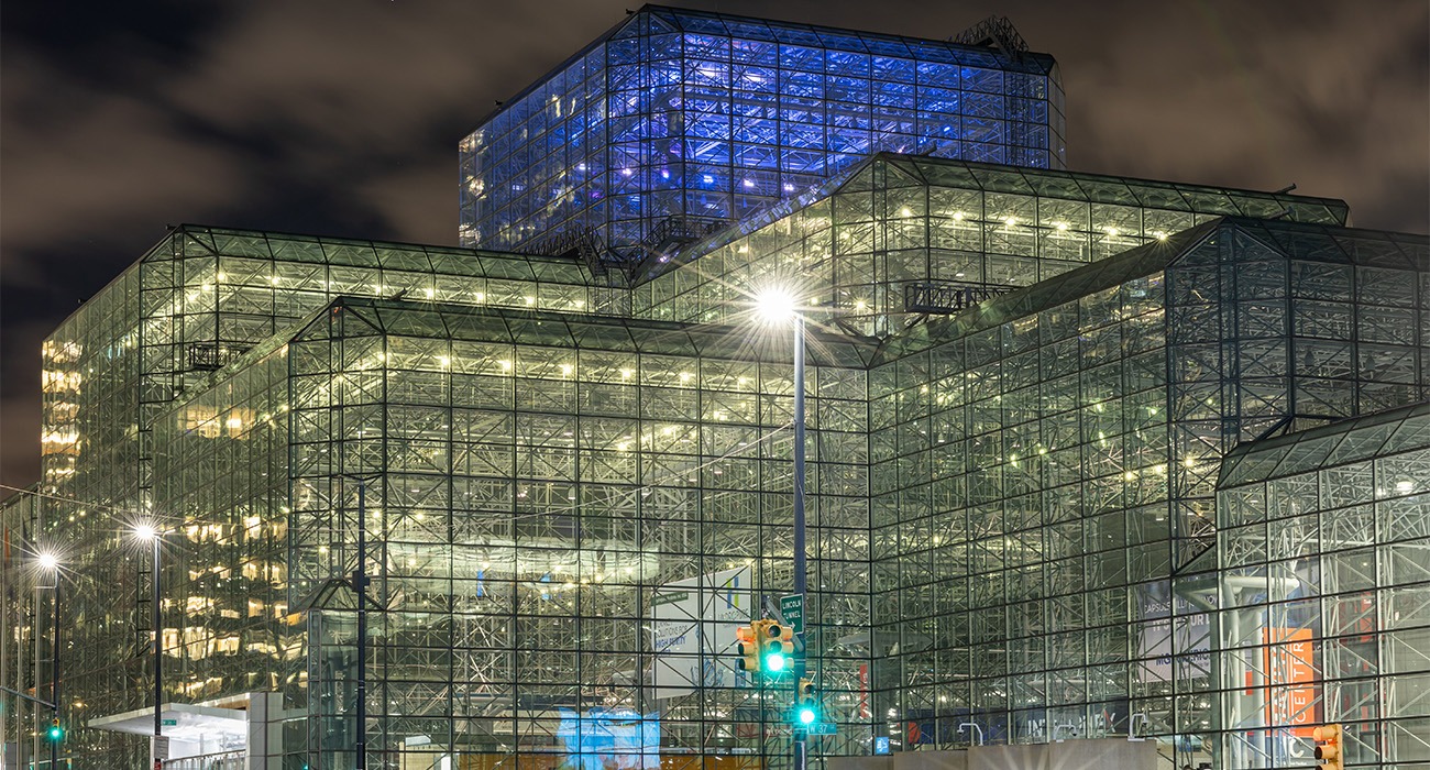 Javits Center exterior with blue lights on top 