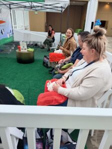 People petting bunnies