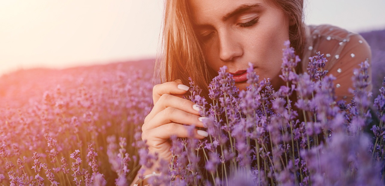 Woman smelling lavender