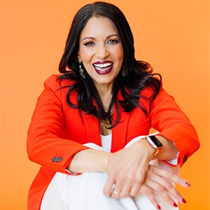 Rashmi Airan in orange coat