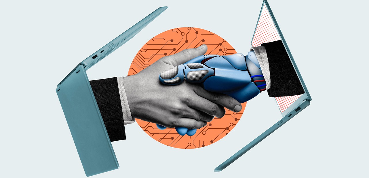 Hands of man and robot shake hands