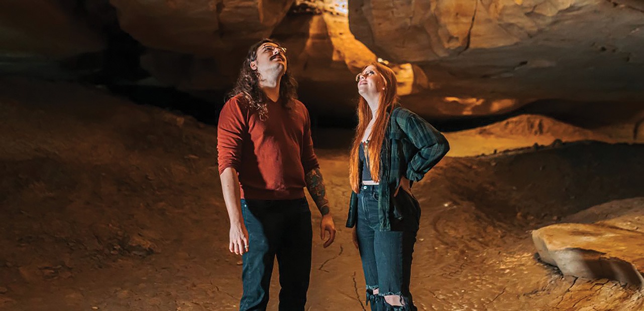 Man and woman in cave
