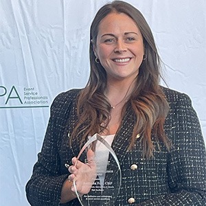 Amanda Fox holding clear plaque