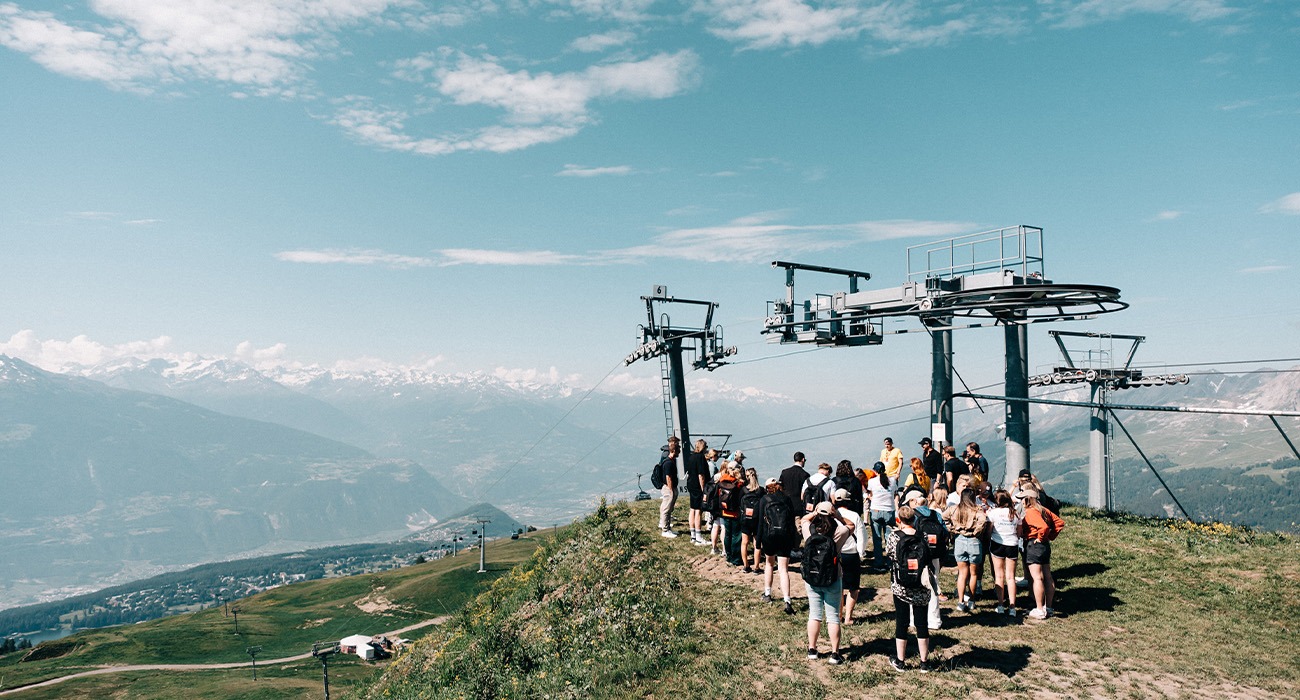 People standing next to gondolas