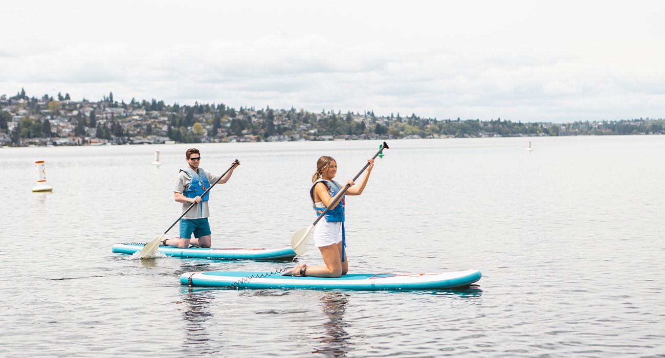 Two people paddleboarding