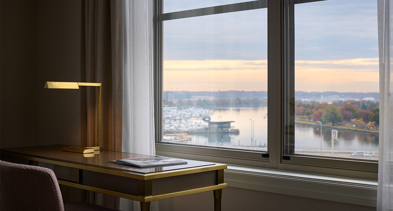 Chair and table in front of window