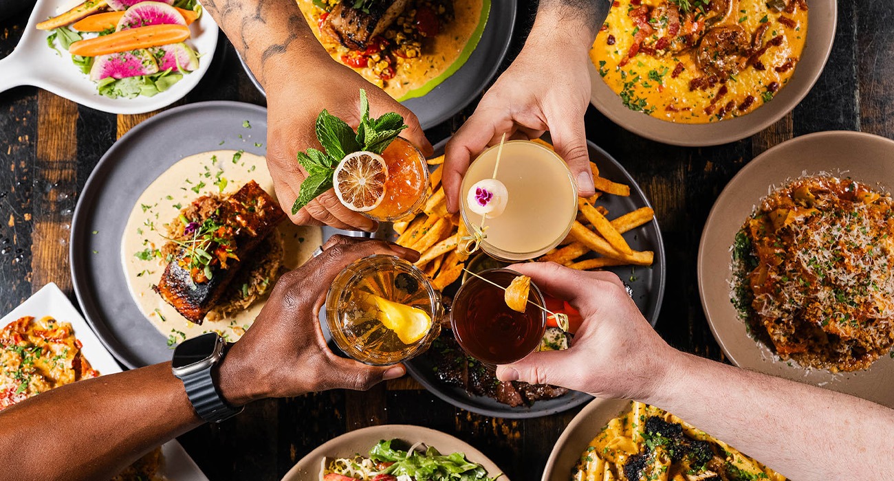 People holding alcoholic drinks
