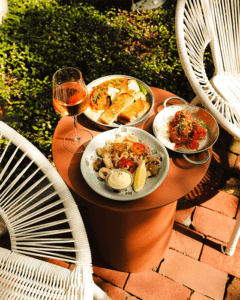 Three plates of various foods