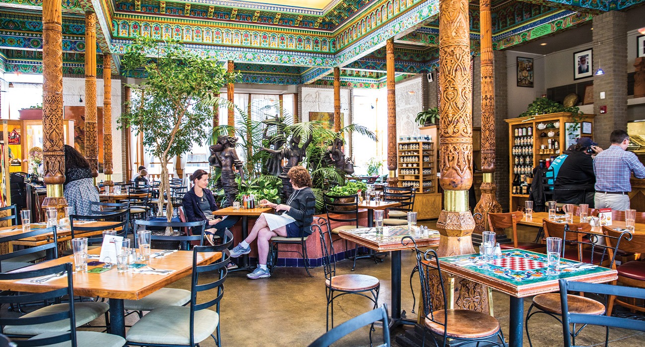 Two women talking in The Boulder Dushanbe Tea House