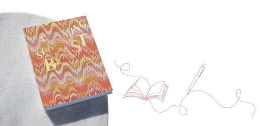 Orange book on table