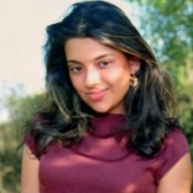 Woman wearing red shirt profile photo