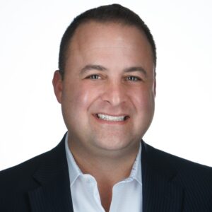 Man with black sport coat and white dress shirt