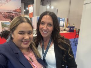 Two woman smiling