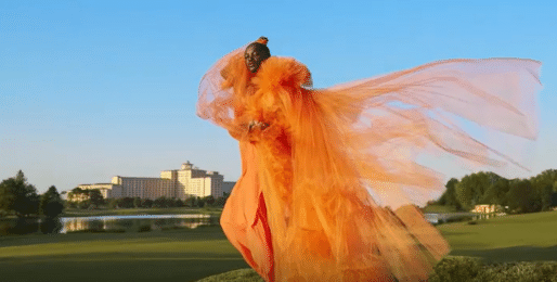 Woman wearing orange dress