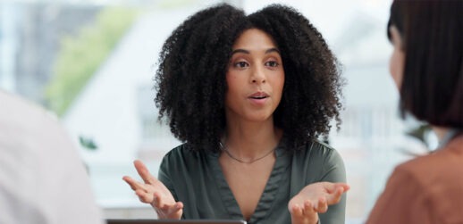 Woman talking to another woman